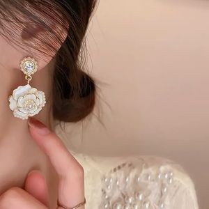 Elegant camellia drop earrings, black or white!